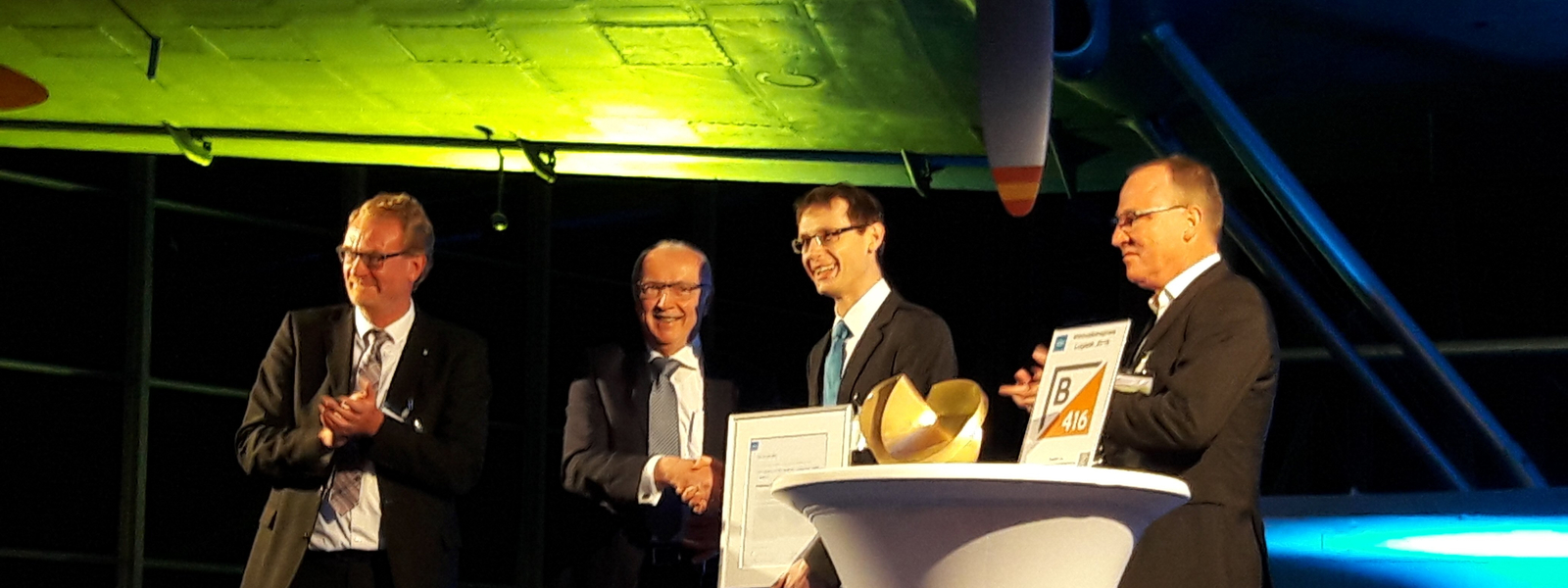Preisverleihung des VDI-Innovationspreis Logistik 2018 in der Flugwerft Schleißheim. Im Bild v.l.n.r.: Jean Haeffs (VDI), Prof. Günthner (TU München), Nandor Schmaus (Schmaus GmbH), Gregor Blauermel (B416 Unternehmensberatung).